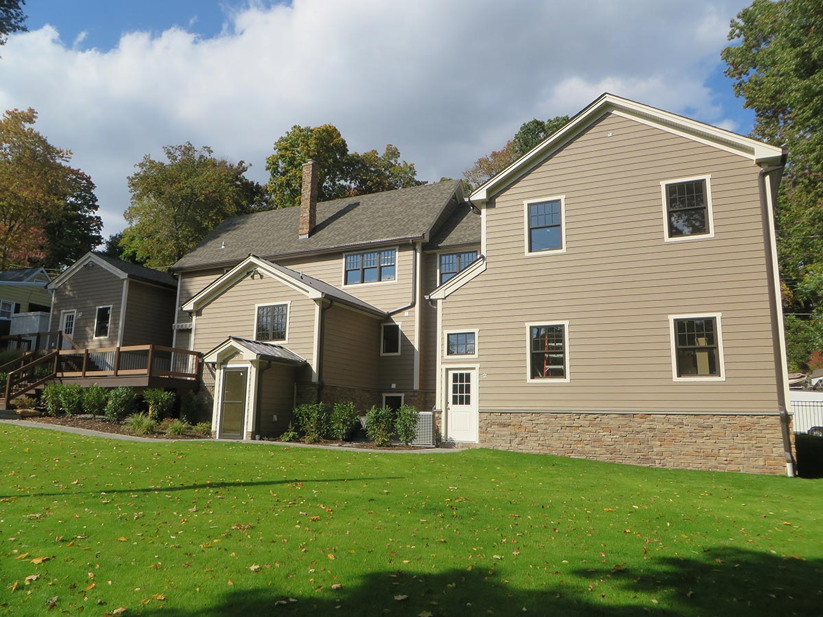 Two story tan siding home