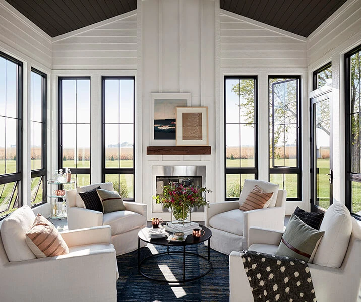 Black casement windows in sunroom