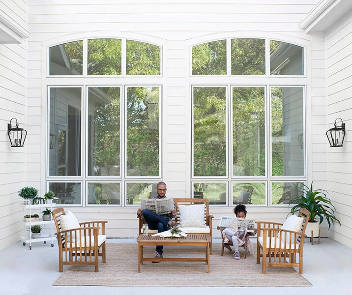 Tall windows on screened porch